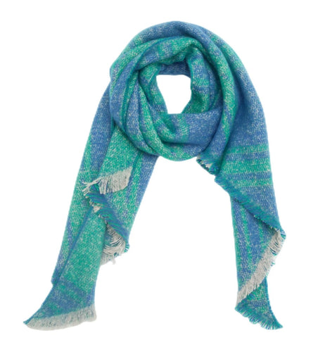 Picture shows our range of Fun Cozy Winter Scarves - in 7 colour ways. This one the Blue Green Option. This acrylic blend wonder is super soft, non-bulky, and an extra layer of warmth for the season. In a stylish  check pattern, it's the perfect partner for your winter ensemble. The rectangle shape with frayed angled edges adds that finishing touch.