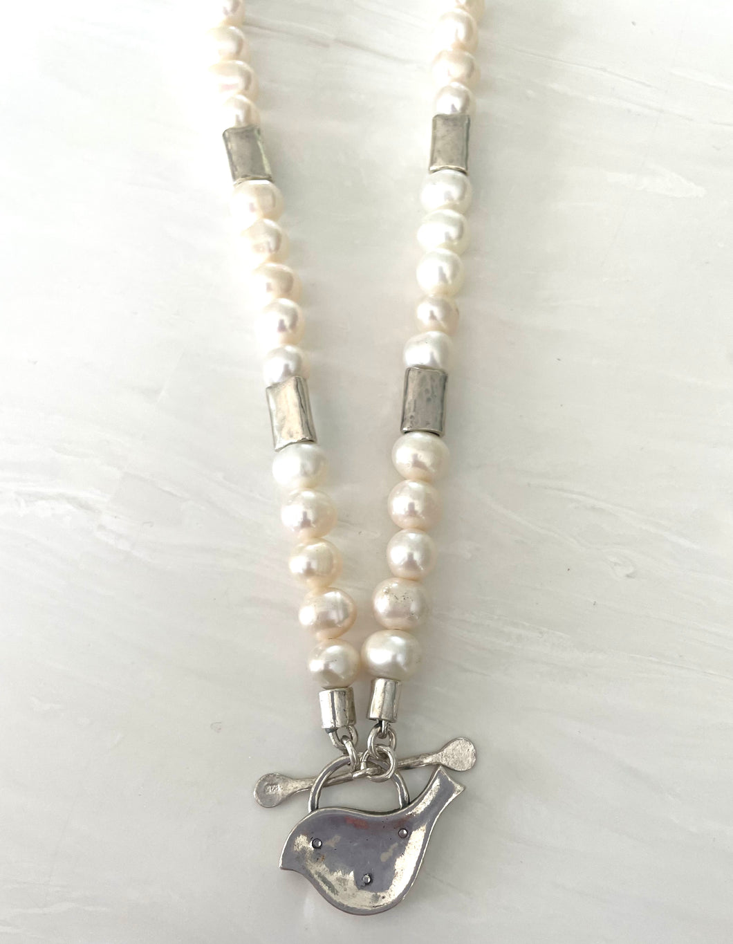 Pearl and Silver hand crafted Necklace with Bird or Fish