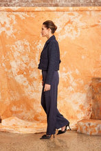 Load image into Gallery viewer, Image shows women standing side on wearing The Aziza Boucle Navy Jacket from Kamare
