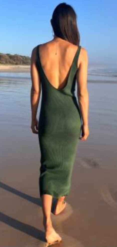 Lilly Pilly Collection Bella Knit Dress in Bottle Green worn on the beach in Byron Bay